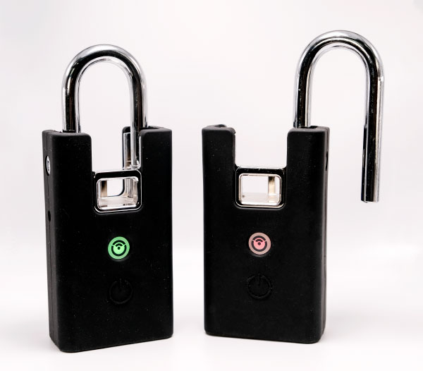Two digital access locks. One locked and one unlocked.