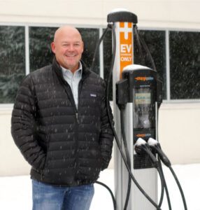 Tim Bennett after supervising the installation of an EV charging station during a Midwest snowstorm.