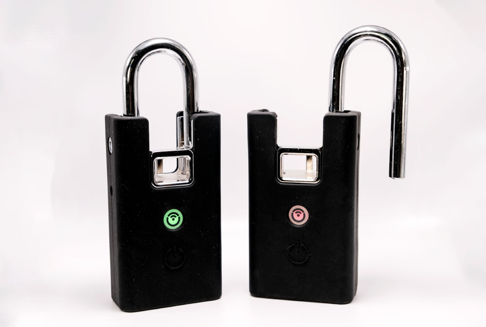 Two digital smart locks. One unlocked and one locked.