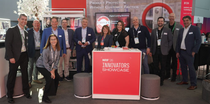 Bailiwick team standing in our 2026 NRF Innovators Showcase booth.