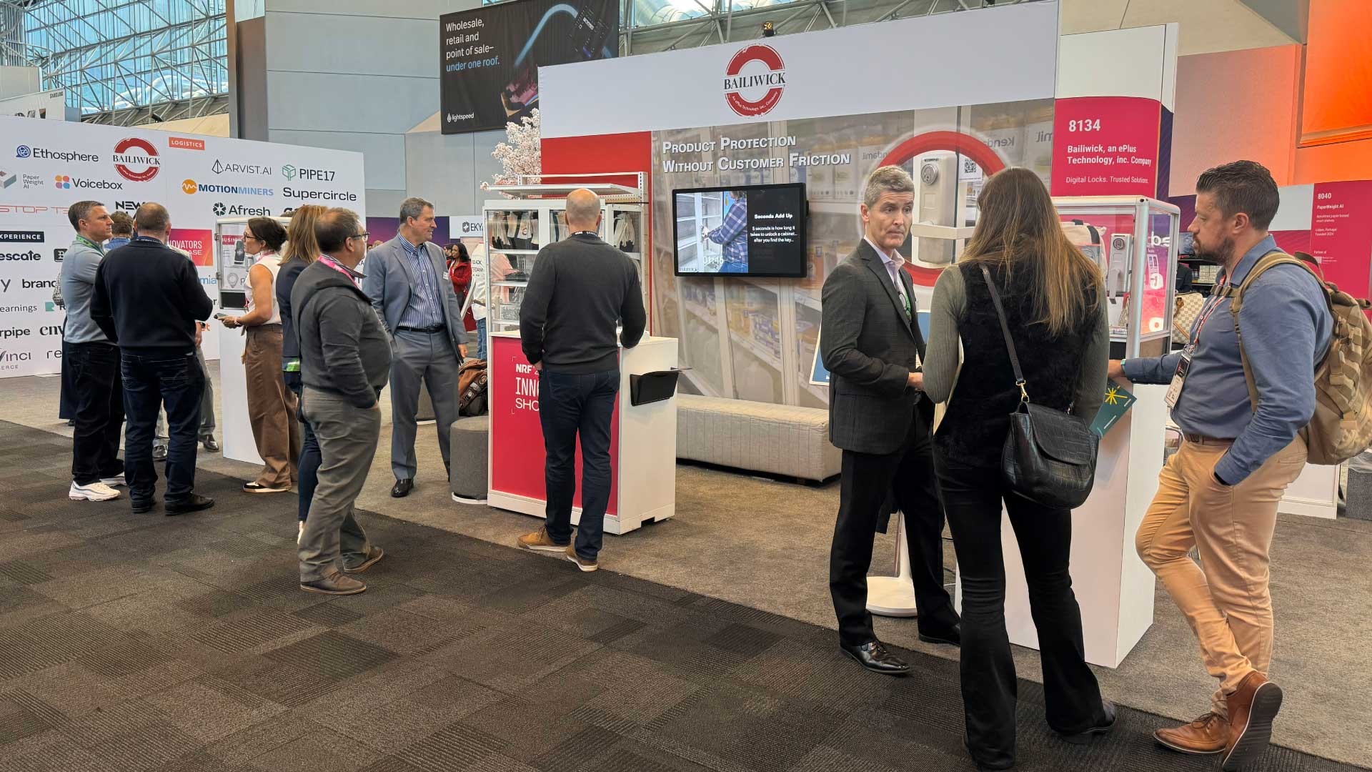 Attendees stop by for Digital Locks demonstrations and information.